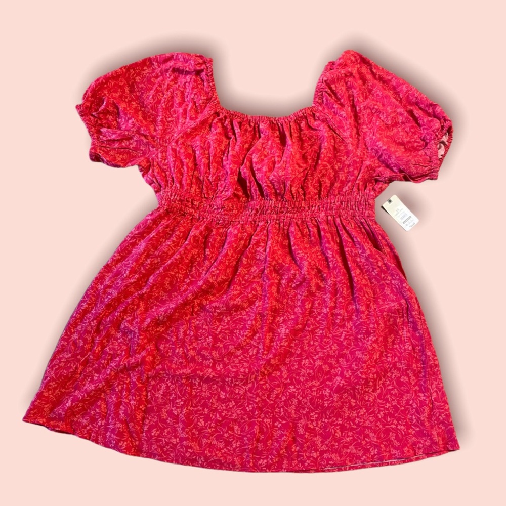 Dress with tie in the back.